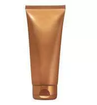 Un tube de crème ou de lotion de couleur bronze.