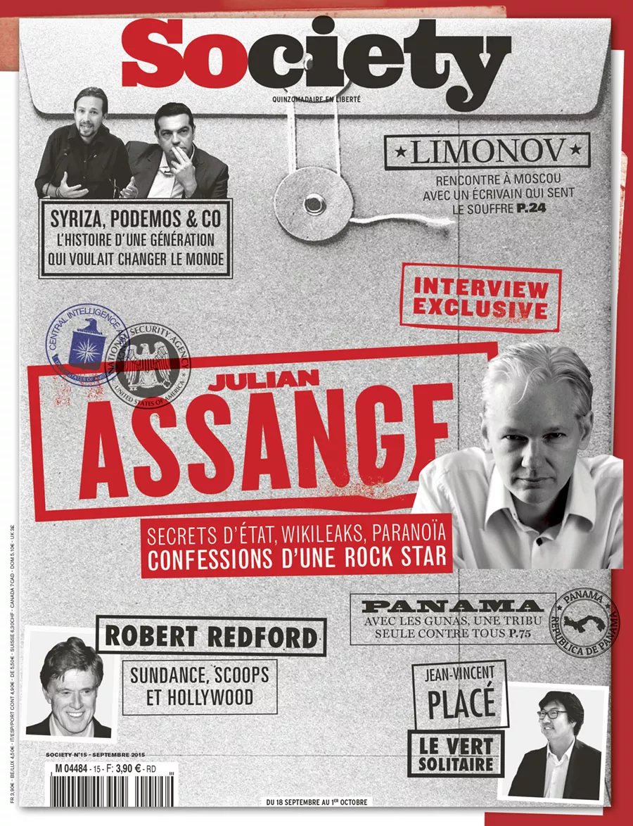 C'est la couverture du magazine "Society" avec un focus principal sur Julian Assange, évoquant des thèmes comme les secrets d'État, WikiLeaks, et la paranoïa. On y trouve aussi des articles sur Syriza et Podemos, une interview exclusive à Moscou avec un écrivain, Robert Redford, et un sujet sur une tribu au Panama.