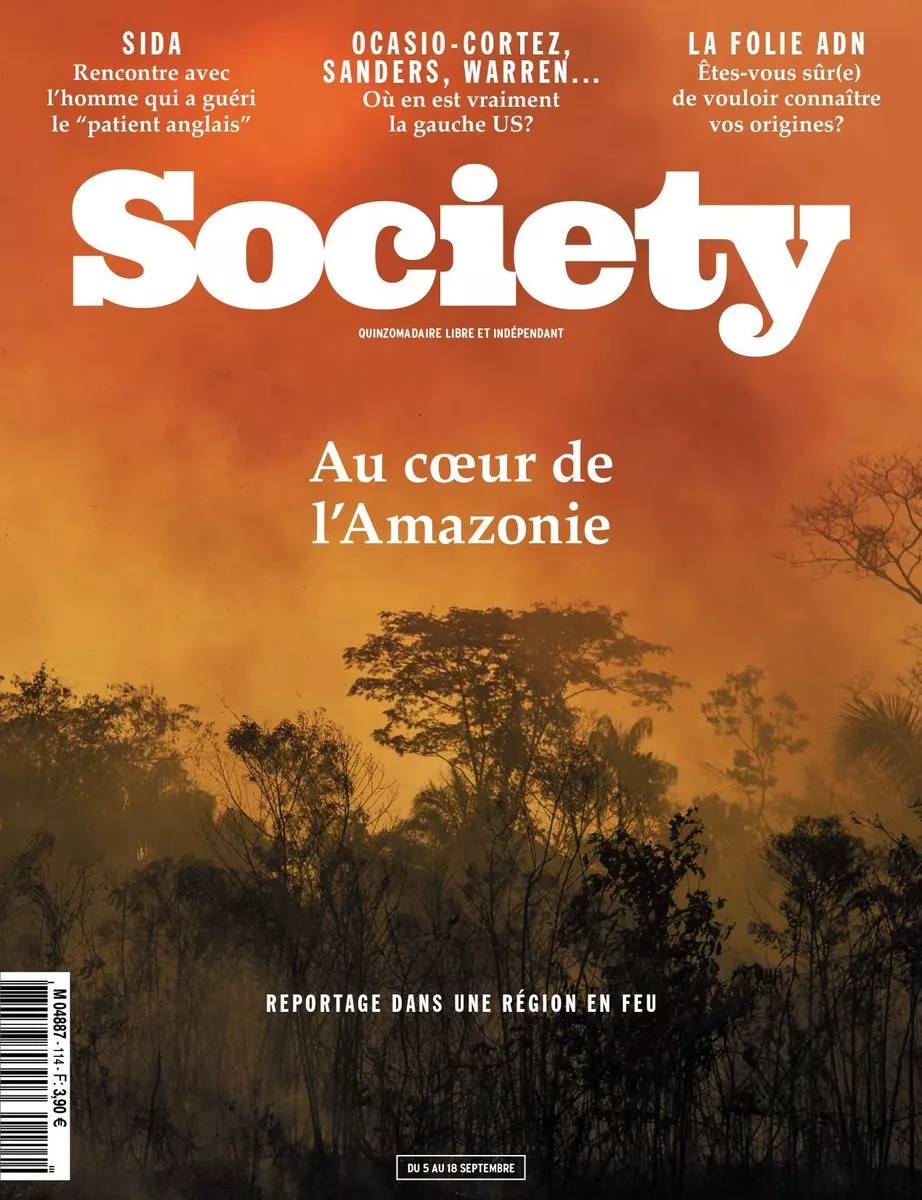 C'est la couverture d'un magazine intitulé "Society" avec le titre principal "Au cœur de l'Amazonie" et des articles sur le SIDA, la gauche américaine, et les tests ADN. L'image de fond montre une forêt en feu.