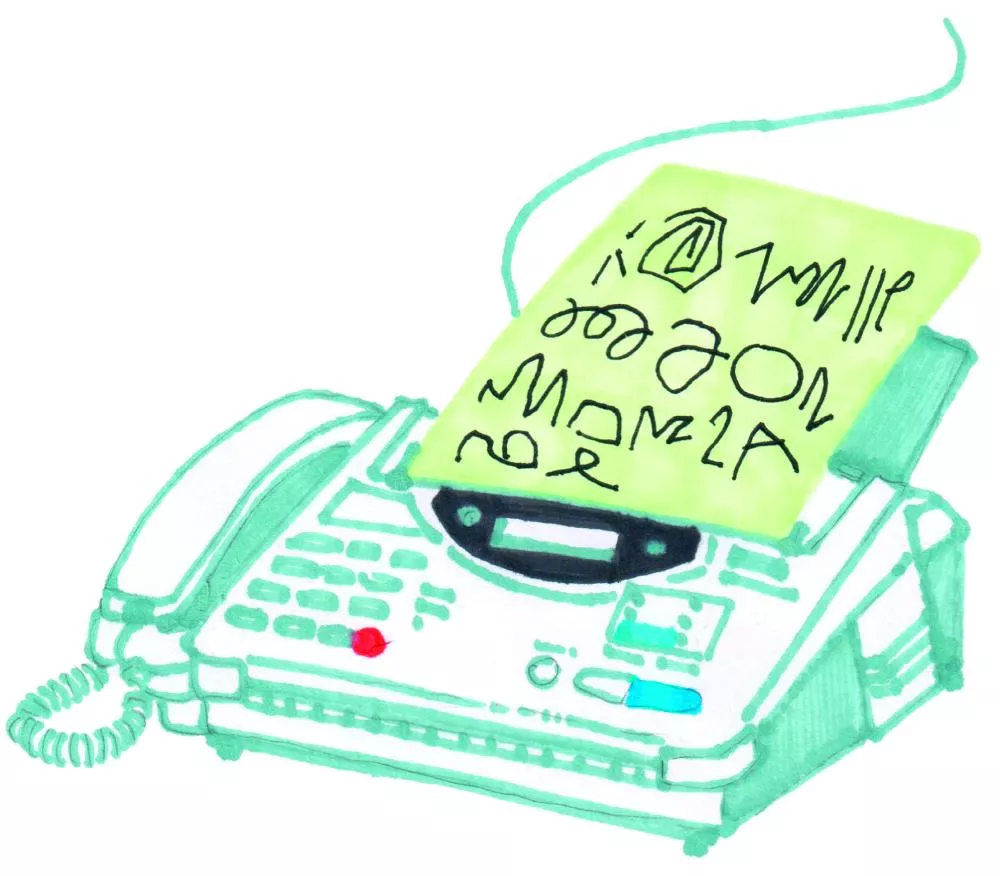 Un télécopieur vert avec une feuille contenant des symboles ou des écritures non reconnaissables.