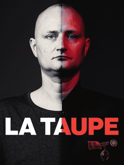 Un homme est présenté en bicolore, moitié en noir et blanc, moitié en couleur. Le texte "LA TAUPE" est écrit en bas, avec "TAUPE" en rouge.